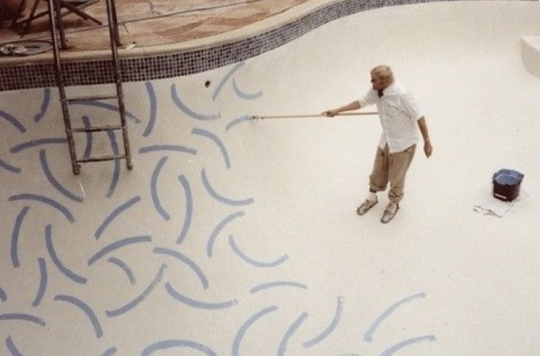 David Hockney painting a pool